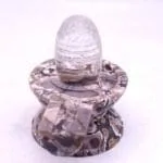 Crystal lingam with Jade base