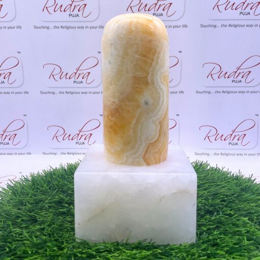 Calcite Lingam With Quartz Stand