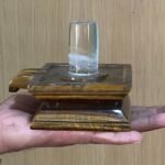 Sphatik Lingam With Tiger Eye Base - 1010 Grams